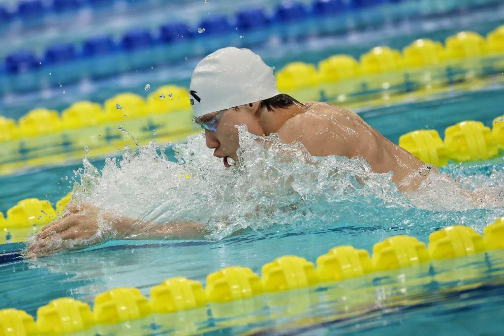 覃海洋小组头名晋级100蛙半决赛 赛后坦言专注自我提升